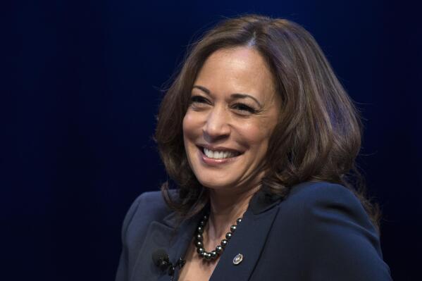 FILE - In this Jan. 9, 2019, file photo, kicking off her book tour, Sen. Kamala Harris, D-Calif., speaks at George Washington University in Washington. On Friday, April 30, 2021, The Associated Press reported on stories circulating online incorrectly asserting that a copy of Harris’ children's book, “Superheroes Are Everywhere,”  is being given to every migrant child in a Long Beach, Calif., facility housing unaccompanied minors who recently arrived at the border. (AP Photo/Sait Serkan Gurbuz, File)