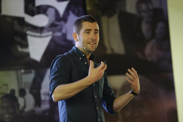 
              FILE- In this Feb. 27, 2017, file photo Facebook's Chief of Product officer, Chris Cox, speaks at the first day of the social media week at the Landmark centre in Lagos, Nigeria. Two top Facebook executives are leaving the company, including Cox, who was long one of CEO Mark Zuckerberg's top deputies. Zuckerberg wrote in a post announcing the news Thursday, March 14, 2019. (AP Photo/Sunday Alamba, File)
            