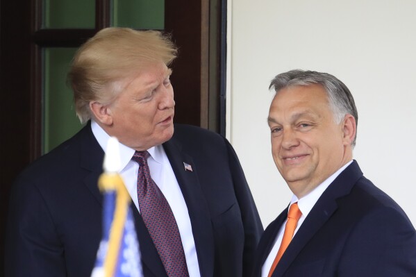 FILE – Then-U.S. President Donald Trump welcomes Hungarian Prime Minister Viktor Orban to the White House in Washington, Monday, May 13, 2019. As chances rise of a Joe Biden-Trump rematch in the U.S. presidential election race, America’s allies are bracing for a bumpy ride. Trump has derided the leaders of some friendly nations, while he has called Orban “a great leader.” (AP Photo/Manuel Balce Ceneta, File)