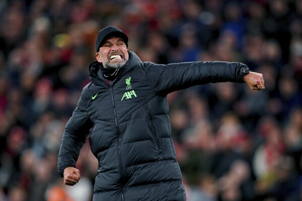 Liverpool manager Juergen Klopp celebrates at the end of the English Premier League soccer match between Liverpool and Luton Town, at Anfield stadium in Liverpool, England, Wednesday, Feb. 21, 2024. (Peter Byrne/PA via 番茄直播)