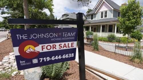 File - A for sale sign stands outside a home on Nevada Avenue Thursday, June 22, 2023, in Colorado Springs, Colo. On Thursday, Freddie Mac reports on this week's average U.S. mortgage rates. (AP Photo/David Zalubowski, File)