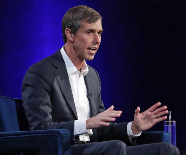 
              Former Democratic Texas congressman Beto O'Rourke gestures during an interview with Oprah Winfrey live on a Times Square stage at "Oprah's SuperSoul Conversations from Times Square," Tuesday, Feb. 5, 2019, in New York. O'Rourke dazzled Democrats in 2018 by nearly defeating Republican Sen. Ted Cruz in the country's largest red state. (AP Photo/Kathy Willens)
            