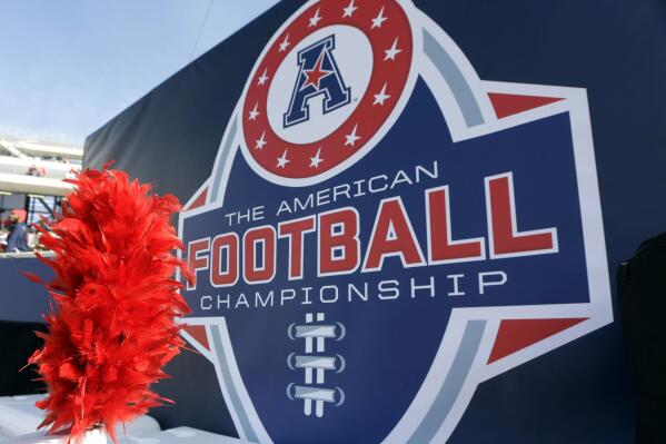 FILE - In this Dec. 5, 2015, file photo, the American Athletic Conference logo is displayed before during the championship NCAA college football game between Houston and Temple in Houston. Six schools from Conference USA — UAB, UTSA, Rice, North Texas, Charlotte and Florida Atlantic — have applied for membership with the AAC and are expected to be accepted by the end of the week, according to two people with knowledge of the process who spoke with The Associated Press, Wednesday, Oct. 20, 2021. (AP Photo/David J. Phillip, File)