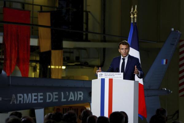 French President Emmanuel Macron delivers his speech at the French Navy base of Toulon, southern France, Wednesday, Nov. 9, 2022. Emmanuel Macron unveils the country's military strategy through the end of the decade for his nuclear-armed country, in the midst of Russia's war in Ukraine. (Eric Gaillard, Pool via AP)