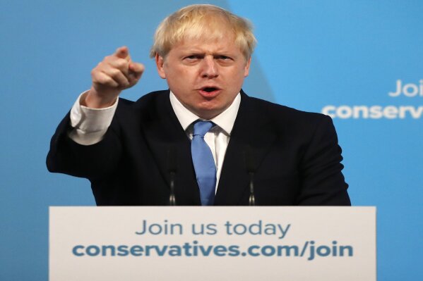 Boris Johnson gestures as he speaks after being announced as the new leader of the Conservative Party in London, Tuesday, July 23, 2019. Brexit champion Boris Johnson won the contest to lead Britain's governing Conservative Party on Tuesday, and will become the country's next prime minister. (AP Photo/Frank Augstein)