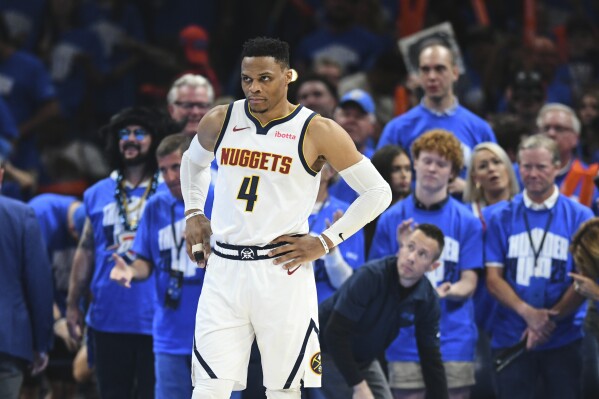 Denver Nuggets' Russell Westbrook (4) stands on the court late in the second half of Game 7 in the Western Conference semifinals of the NBA basketball playoffs against the Oklahoma City Thunder, Sunday, May 18, 2025, in Oklahoma City. (AP Photo/Kyle Phillips)