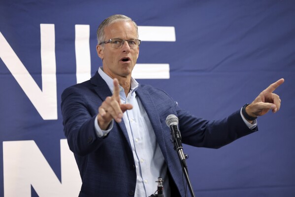 Sen. John Thune of South Dakota, speaks in support of Ohio Republican candidate for the United States Senate, Bernie Moreno (not pictured) during a bus tour stop for the Ohio Senate race in Columbus, Ohio, Monday, Oct. 28, 2024. (AP Photo/Joe Maiorana)