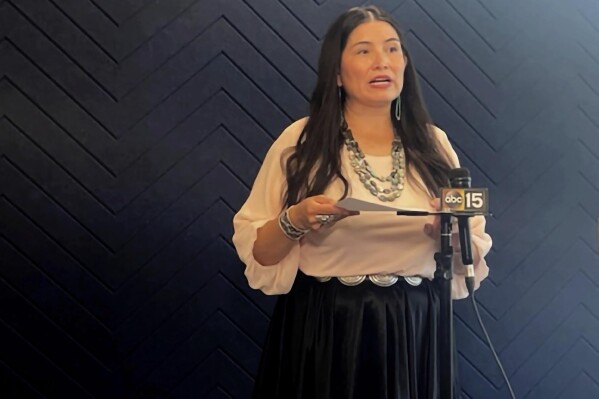 Navajo Nation Attorney General Ethel Branch speaks at a news conference on Monday, June 23, 2023, in Phoenix to offer an update on Operation Rainbow Bridge, a plan that aims to help tribal members who have been affected by a massive Medicaid fraud scheme. (AP Photo/Anita Snow)