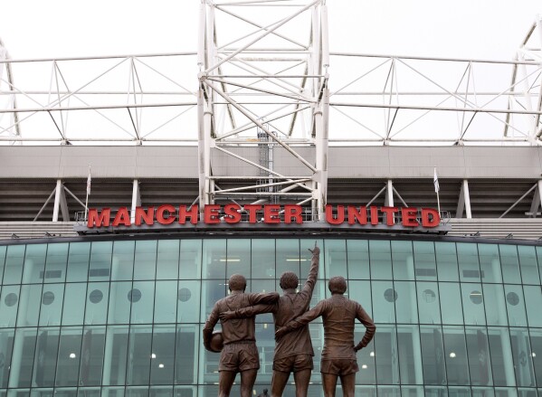 FILE - A general view of Old Trafford stadium ahead of the English Premier League soccer match between Manchester United and West Bromwich Albion in Manchester, England, March 11, 2012. British billionaire Jim Ratcliffe has finally got his hands on Manchester United after securing a stake of up to 25% in the Premier League club. His investment in United — with the club confirming a deal on Sunday Dec. 24. 2023. subject to Premier League approval — comes after moves elsewhere in European soccer that could have seen him take control of one of United’s main Premier League rivals as recently as last year. (AP Photo/Scott Heppell, File)