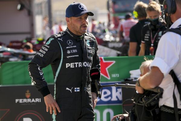 Mercedes driver Valtteri Bottas of Finland answers media's questions after completing the qualifying session for Sunday's Formula One Dutch Grand Prix at the Zandvoort racetrack, Netherlands, Saturday, Sept. 4, 2021. Bottas set the third fastest time. (AP Photo/Francisco Seco, Pool)