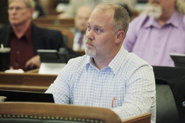Kansas House Taxation Committee Chair Adam Smith, R-Weskan, follows remarks at the end of the House's session just before members adjourn for the year, Friday, April 28, 2023, at the Statehouse in Topeka, Kan. No big tax cuts are coming for Kansas residents even though the state treasury is bulging with surplus cash. (AP Photo/John Hanna)