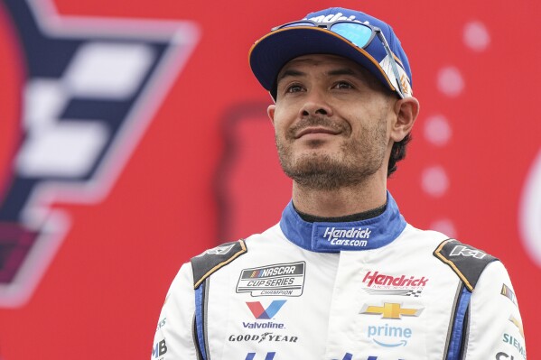 Kyle Larson is introduced to fans prior to a NASCAR Cup Series auto race at Charlotte Motor Speedway, Sunday, May 25, 2025, in Concord, N.C. (AP Photo/Matt Kelley)