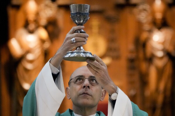 Monsignor Victor Manuel Fernandez, archbishop of La Plata, officiates a Mass at the Cathedral in La Plata, Argentina, Sunday, July 9, 2023. Fernandez was appointed by Pope Francis to head the Holy See's Dicastery for the Doctrine of the Faith at the Vatican. (AP Photo/Natacha Pisarenko)