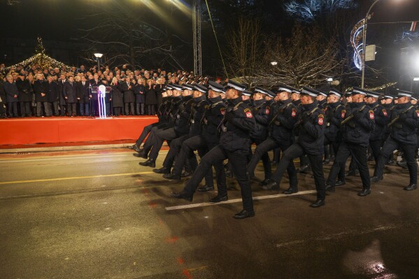 Members of the police forces of the Republic of Srpska march during a parade marking the 32nd anniversary of the Republic of Srpska, in the Bosnian town of Banja Luka, 240 kms northwest of Sarajevo, Tuesday, Jan. 9, 2024. The United States on Tuesday warned that ongoing celebrations of a Bosnian Serb self-proclaimed national holiday were in violation of Bosnia's constitution and a 1995 peace agreement, and as such amounted to a criminal offense. The Jan. 9 holiday commemorates the date in 1992 when Bosnian Serbs declared the creation of their own state in Bosnia, igniting the country's devastating four-year war that killed more than 100,000 people. (AP Photo/Radivoje Pavicic)