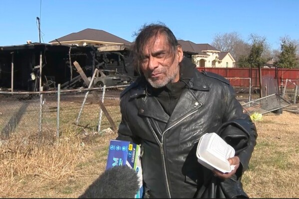 In the image, taken from the video, Jonathan Joss speaks with reporters following the fire in San Antonio, Texas on Thursday, January 23, 2025.