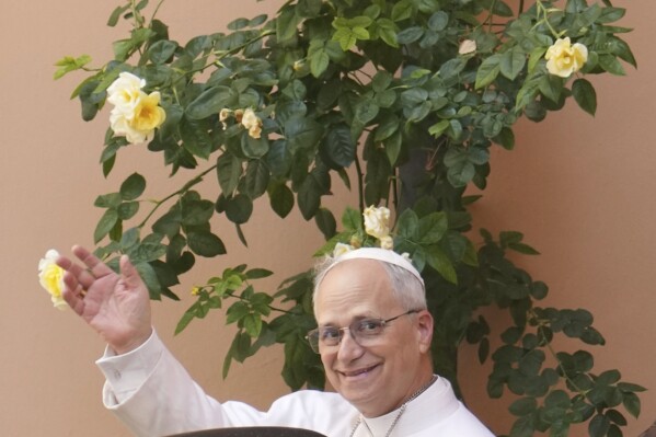 Pope Leo XIV leaves the Augustinian General House in Rome after a visit on Tuesday, May 13, 2025. (AP Photo/Domenico Stinellis)