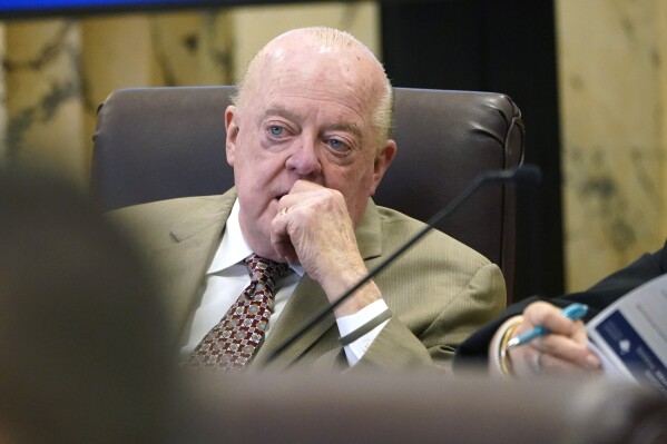 FILE - Mississippi Sen. John Polk, R-Hattiesburg, listens to a discussion about education at the state Capitol, Feb. 8, 2024, in Jackson, Miss. Polk filed a bill to close three of Mississippi's eight public universities by 2028, but other legislators say the bill is unlikely to become law. (AP Photo/Rogelio V. Solis, File)