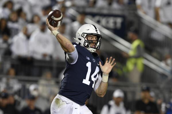 FILE - Penn State quarterback Sean Clifford (14) passes against Indiana in the first half of their NCAA college football game in State College, Pa., in this Saturday, Oct. 2, 2021, file photo. The key matchup in fourth-ranked Penn State's showdown with No. 3 Iowa pits the Nittany Lions' passing combo of Sean Clifford and Jahan Dotson against a defense that leads the nation with 12 interceptions.(AP Photo/Barry Reeger, File)