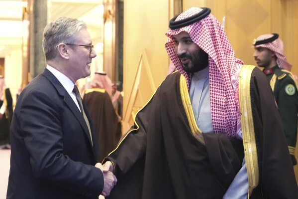 Britain's Prime Minister Keir Starmer meets Saudi Arabian Crown Prince Mohammed bin Salman Al Saud at the Royal Court in Riyadh, Saudi Arabia, Monday, Dec. 9, 2024 during his three day visit of United Arab Emirates, Saudi Arabia and Cyprus.(AP Photo/Kirsty Wigglesworth, Pool)