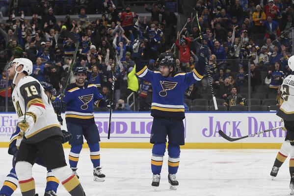 St. Louis Blues' Brandon Saad (20) celebrates after scoring a goal during the second period of the team's NHL hockey game against the Vegas Golden Knights on Monday, Nov. 22, 2021 in St. Louis. (AP Photo/Michael Thomas)