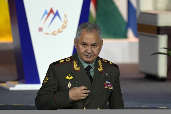 Russian Defense Minister Sergei Shoigu walks down from the podium after speaking at the 10th Beijing Xiangshan Forum held in Beijing, Monday, Oct. 30, 2023. Defense Minister Shoigu said Monday the United States is fueling geopolitical tensions to uphold its 