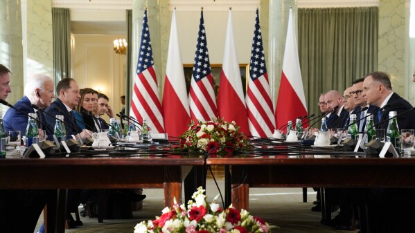 FILE - President Joe Biden, left, and Polish President Andrzej Duda, right, meet Tuesday, Feb. 21, 2023, in Warsaw. The Biden administration announced Monday, Sept. 25, that it is offering a $2 billion loan to Poland, which has been a hub for weapons going into Ukraine, to support the ally's defense modernization. (AP Photo/Evan Vucci, File)