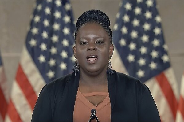 In this image from video, Stacia Brightmon speaks from Washington, during the fourth night of the Republican National Convention on Thursday, Aug. 27, 2020.  It's called a “permission structure.” President Donald Trump's campaign is trying to construct an emotional and psychological gateway to help disenchanted voters feel comfortable voting for the president again despite their reservations about him personally. (Courtesy of the Committee on Arrangements for the 2020 Republican National Committee via AP)