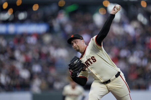 San Francisco Giants pitcher Blake Snell throws to a Washington Nationals batter during the first inning of a baseball game Monday, April 8, 2024, in San Francisco. (AP Photo/Godofredo A. Vásquez)