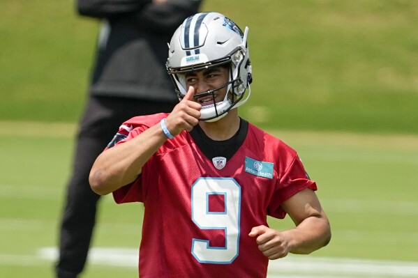 FILE - Carolina Panthers quarterback Bryce Young gestures during the NFL football team's rookie minicamp, Friday, May 12, 2023, in Charlotte, N.C. The Panthers are counting on No. 1 overall pick Bryce Young to end a five-year playoff drought. (AP Photo/Chris Carlson, File)