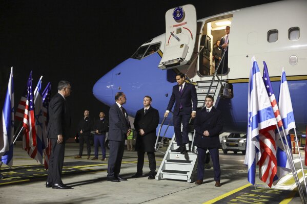 U.S. Secretary of State Marco Rubio arrives in Israel on the first leg of his Middle East trip, as Israel's Foreign Minister Gideon Sa'ar waits to welcome him, in Tel Aviv, Israel, Saturday, Feb. 15, 2025. (Evelyn Hockstein/Pool Photo via AP)