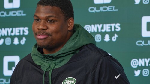 FILE - New York Jets' Quinnen Williams speaks to reporters after a practice at the NFL football team's training facility in Florham Park, N.J., May 24, 2022. Williams and the Jets have agreed, Thursday, July 13, 2023, to a four-year contract extension worth $96 million, according to a person with knowledge of the deal. (AP Photo/Seth Wenig, File)