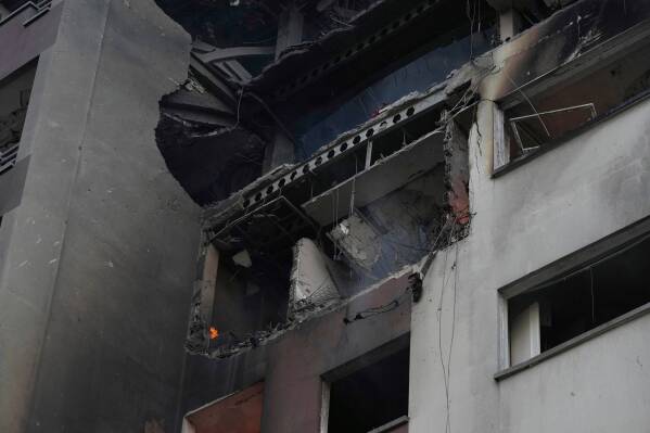 Damage is seen in a building after an explosion in a residence compound after Israel attacked Iran's capital Tehran, Friday, June 13, 2025. (AP Photo/Vahid Salemi)