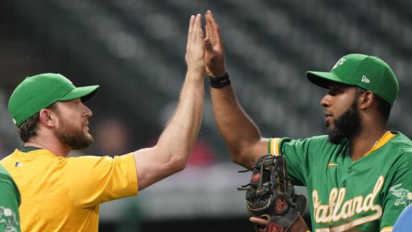 Jed Lowrie hits 3-run homer in 8th, A's beat Indians 6-3