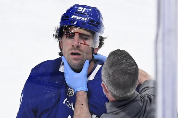 Maple Leafs' Tavares taken off on stretcher after collision