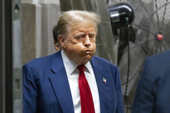 Former President Donald Trump appears at Manhattan criminal court before his trial in New York, Tuesday, April 30, 2024.  (Justin Lane/Pool Photo via AP)