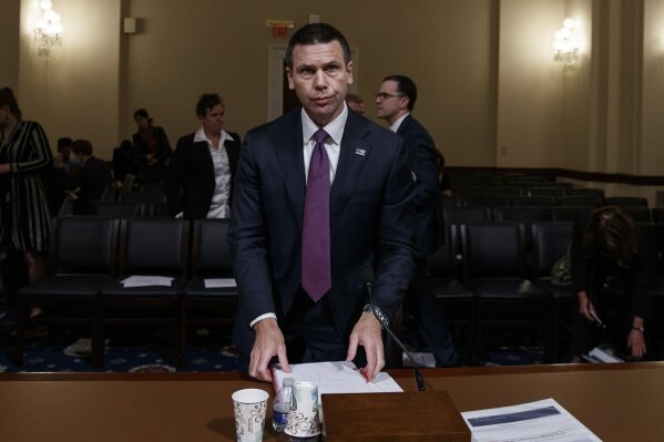 
              Acting Secretary of Homeland Security Kevin McAleenan on Capitol Hill in Washington, Wednesday, May 22, 2019, prepares to leave after the House Homeland Security Committee on budget. (AP Photo/Carolyn Kaster)
            