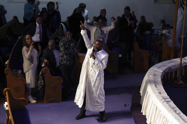 Rev. William Lamar IV, pastor at Metropolitan African Methodist Episcopal Church, leads service in Washington on Sunday, March 2, 2025. (AP Photo/Jessie Wardarski)
