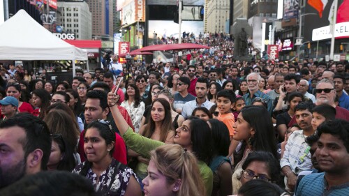FILE — Spectators look on during the Diwali festival at a Times Square celebration, Oct. 7, 2017, in New York. New York City will add the Hindu festival of Diwali to the list of public school holidays in recognition of the growth of the city's South Asian and Indo-Caribbean communities, Mayor Eric Adams announced Monday, June 26, 2023. (AP Photo/Kevin Hagen)