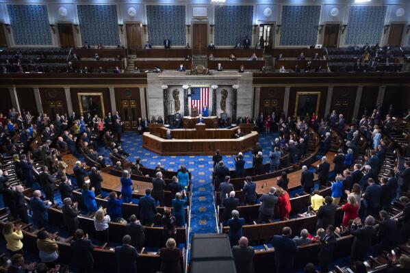 FILE - President Joe Biden delivers his first State of the Union address to a joint session of Congress at the Capitol, Tuesday, March 1, 2022, in Washington.  On Friday, March 18, The Associated Press reported on stories circulating online incorrectly claiming members of Congress gave themselves a 21% pay raise in early March.(Jim Lo Scalzo/Pool via AP, File)