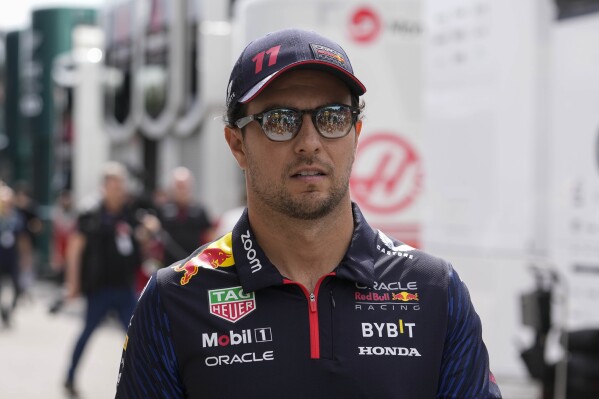 Red Bull driver Sergio Perez of Mexico arrives at the Monza racetrack, in Monza, Italy , Thursday, Aug. 31, 2023. The Formula one race will be held on Sunday. (AP Photo/Luca Bruno)