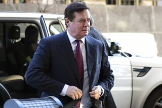 
              FILE - In this Dec. 11, 2017, file photo, former Trump campaign chairman Paul Manafort arrives at federal court in Washington. Recently unsealed criminal charges against President Donald Trump’s ex-campaign chairman could also pose legal risks for the banks that lent him millions of dollars. For years Paul Manafort has borrowed heavily against multiple properties in New York. The banks’ exposure could be worst of all for a bank dubbed “Lender B” in court papers. (AP Photo/Susan Walsh, File)
            