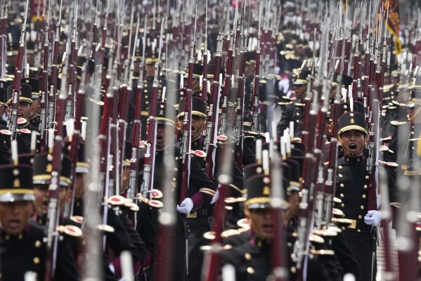 Heroic Military Academy cadets march in the annual Independence Day military parade in the capital's main square, the Zocalo, in Mexico City, Saturday, Sept. 16, 2023. (AP Photo/Fernando Llano)