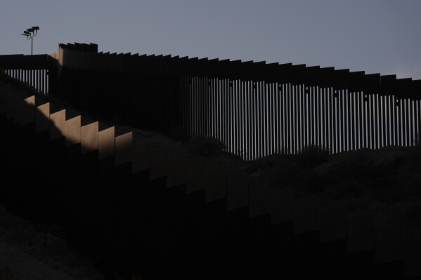 Two walls separate Mexico from the United States along the border Tuesday, Jan. 28, 2025, in Tijuana, Mexico. (AP Photo/Gregory Bull)