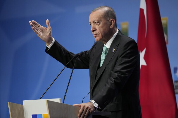 Turkish President Recep Tayyip Erdogan addresses a media conference during a NATO summit in Vilnius, Lithuania, Wednesday, July 12, 2023. NATO leaders gathered Wednesday to launch a highly symbolic new forum for ties with Ukraine, after committing to provide the country with more military assistance for fighting Russia but only vague assurances of future membership. (AP Photo/Pavel Golovkin)