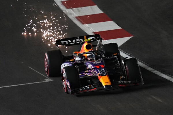 Red Bull driver Sergio Perez, of Mexico, drives during the second practice for the Formula One Las Vegas Grand Prix auto race, Friday, Nov. 17, 2023, in Las Vegas. (AP Photo/John Locher)