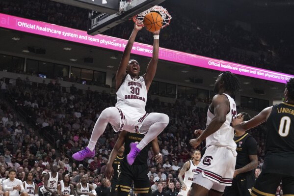 South Carolina forward Collin Murray-Boyles (30) dunks the ball during the second half of an NCAA college basketball game against Vanderbilt, Saturday, Feb. 10, 2024, in Columbia, S.C. (APPhoto/David Yeazell)