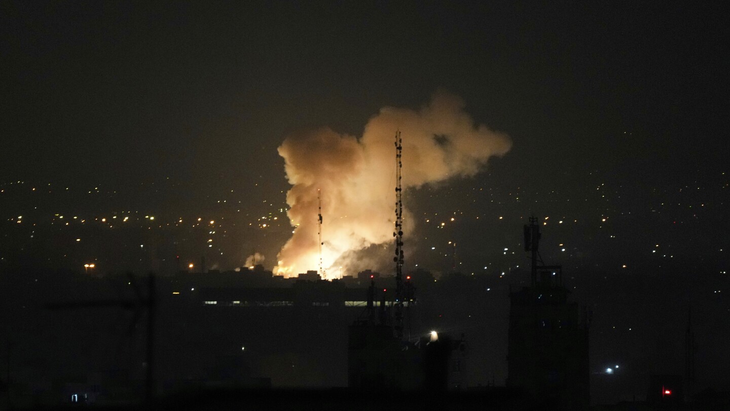Israel attacks Iran's capital with explosions booming across Tehran