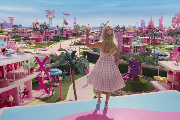 This image released by Warner Bros. Pictures shows Margot Robbie in a scene from "Barbie." (Warner Bros. Pictures via AP)