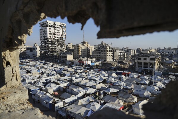A makeshift tent camp for displaced Palestinians stretches across Gaza City on Tuesday, May 6, 2025. (AP Photo/Jehad Alshrafi)