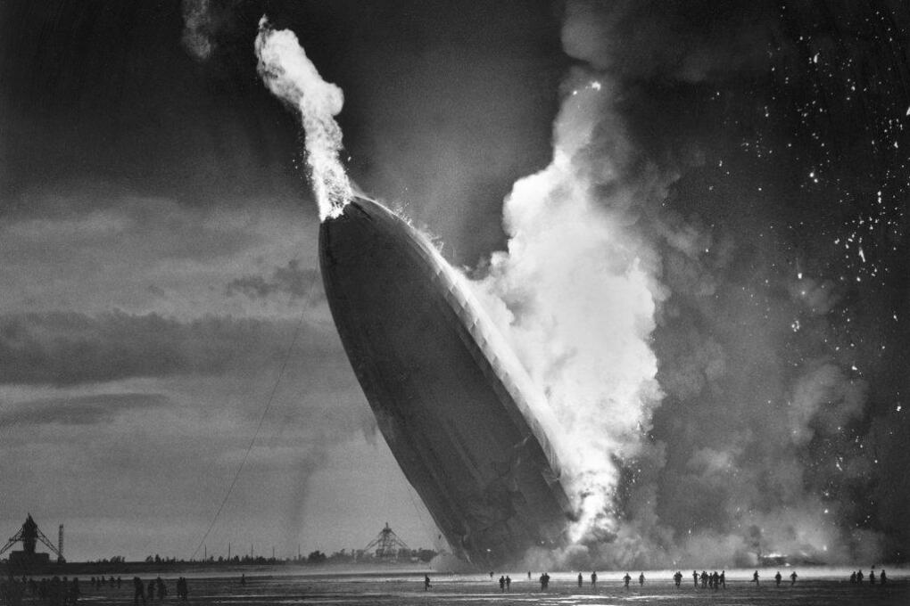 FILE - In this May 6, 1937 file photo, the German dirigible Hindenburg crashes to earth in flames after exploding at the U.S. Naval Station in Lakehurst, N.J. (AP Photo/Murray Becker, File)